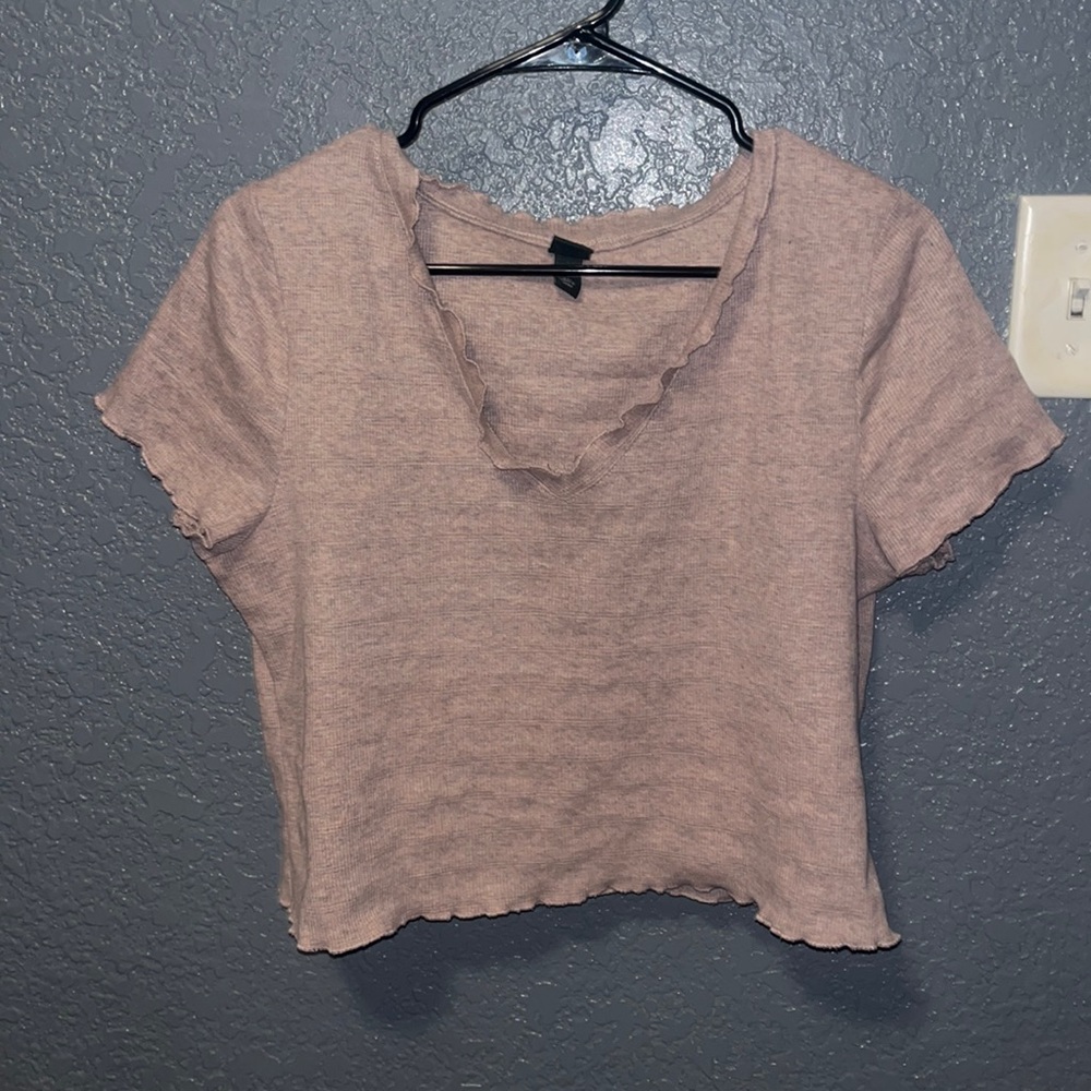 V-neck shirt with ruffles. The brand is wild fable from target!